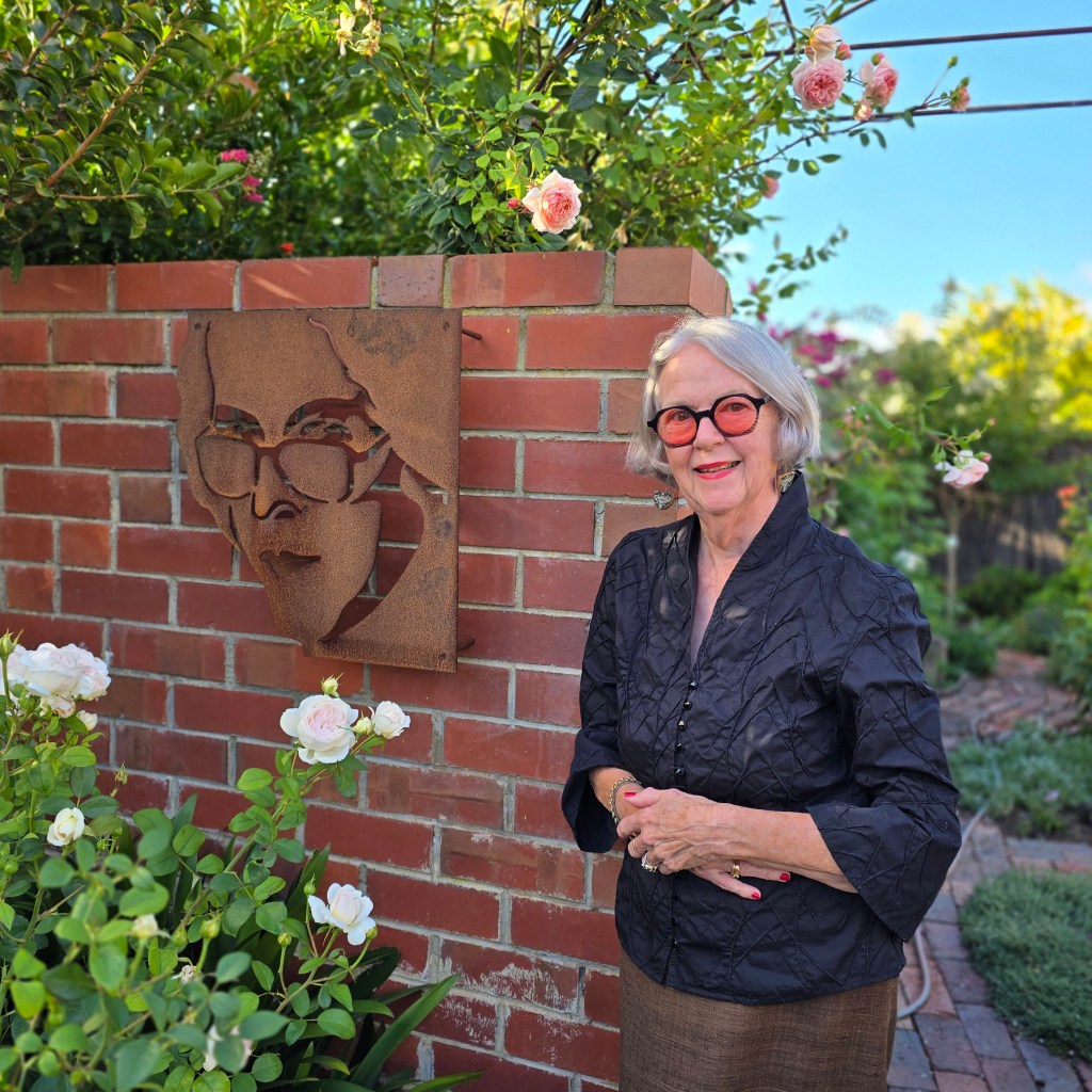 a laser cut wall structure, made by her brother, Gavin Murphy, based on a portrait of Maureen by Nova Smith 